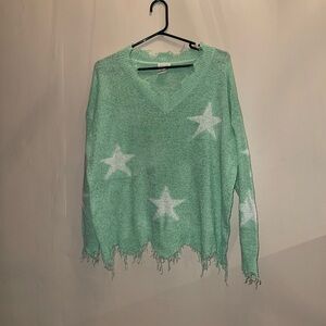 Green star sweater. Size L